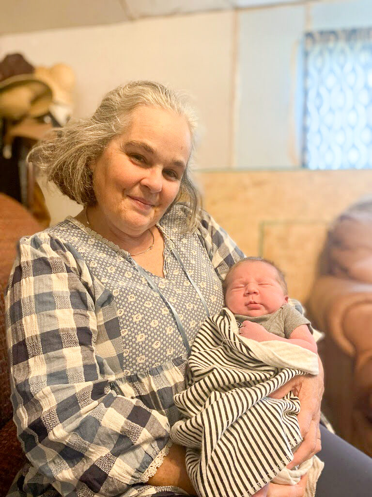 Karen holding a baby